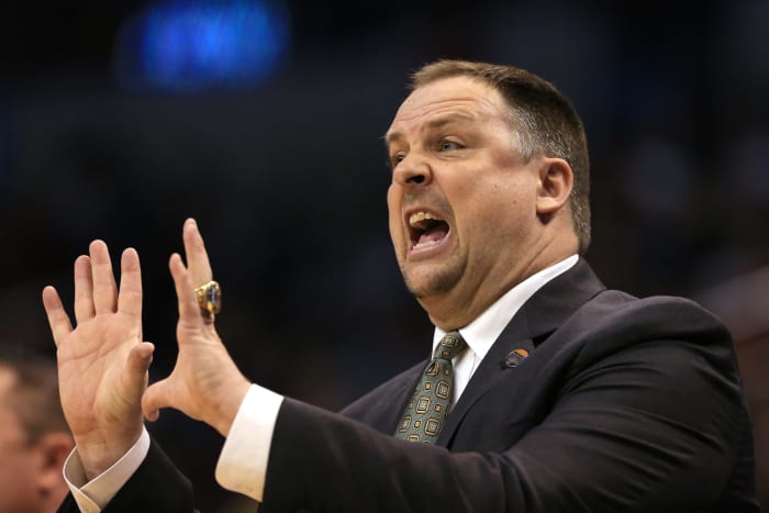 Linc Darner gestures to his players on the sideline during a game.