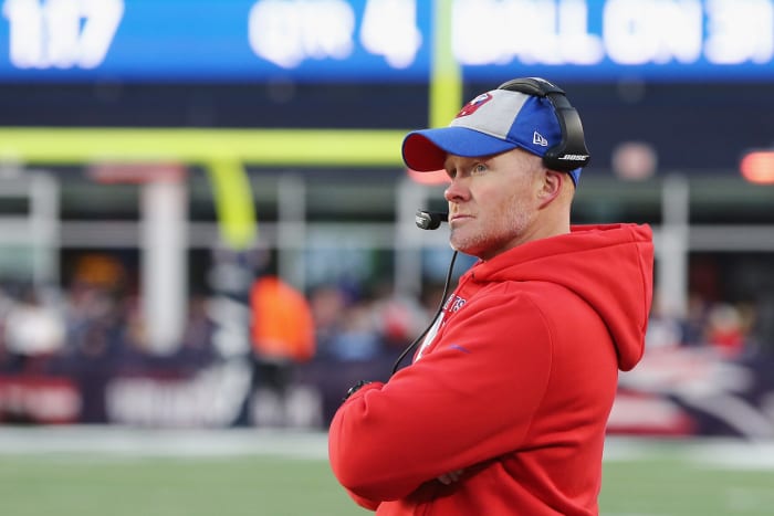 Sean McDermott looks onto the field as coach.