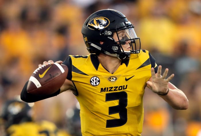 Missouri QB Drew Lock throwing a pass.