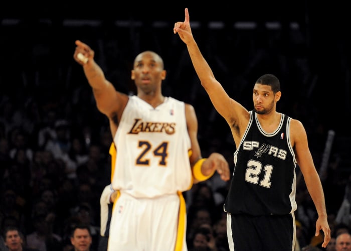 NBA Hall of Fame hopefuls Kobe Bryant and Tim Duncan during a basketball game.