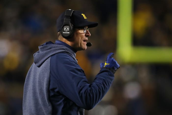 A closeup of Jim Harbaugh during a Michigan football game.