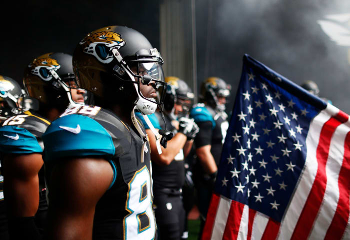 The Jacksonville Jaguars standing in the tunnel waiting to walk onto the field.