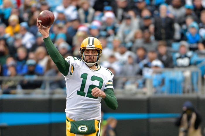 Aaron Rodgers throwing a pass.