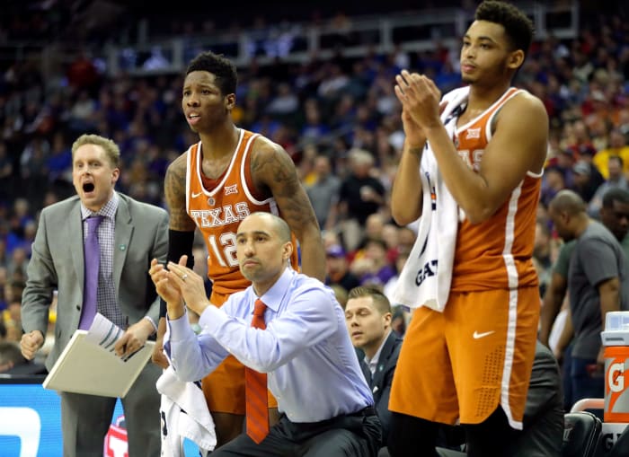 Shaka Smart reacting during a Texas Longhorns basketball game.