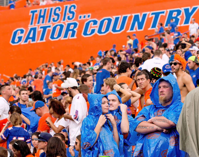Florida Gators fans watching the game in the rain.