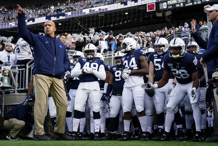James Franklin leads Penn State out of the tunnel.