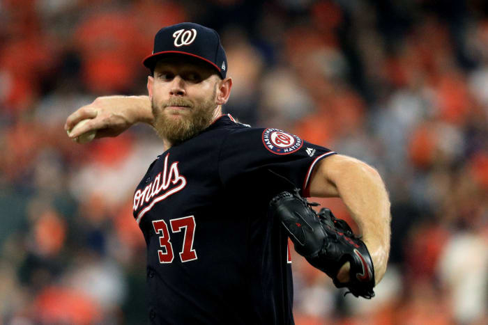 Stephen Strasburg pitches in the World Series for the Nationals.