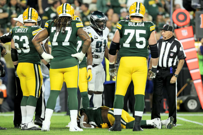 Jamaal Williams on the ground after a nasty hit.