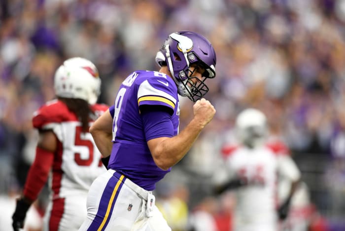 Kirk Cousins celebrating during a Vikings game.