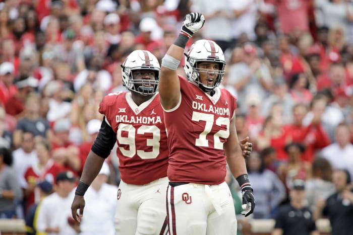 Oklahoma defenisve linemen Tyreece Lott and Amani Bledsoe celebrate a big play against Baylor.