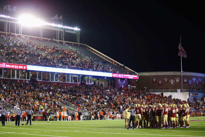 Boston College's football team huddled up on the field.