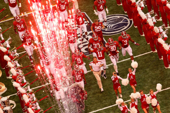 Head coach Nick Saban of the Alabama Crimson Tide takes the field with his players during the 2012 Allstate BCS National Championship Game.