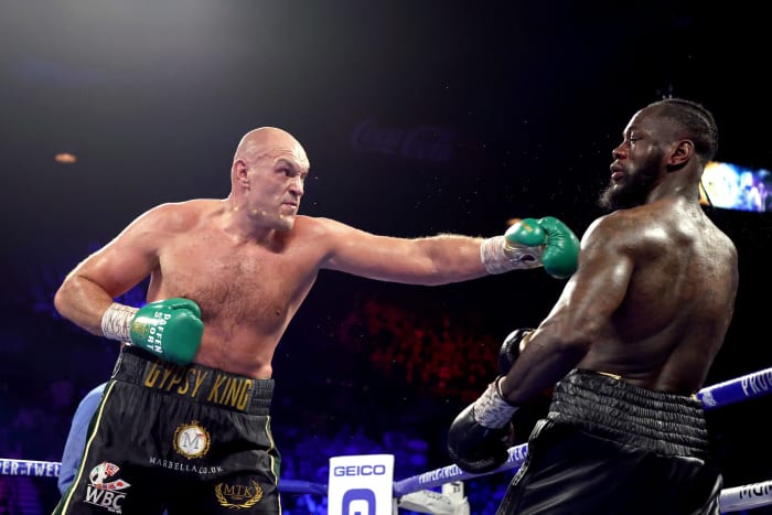 Tyson Fury and Deontay Wilder on Saturday night.