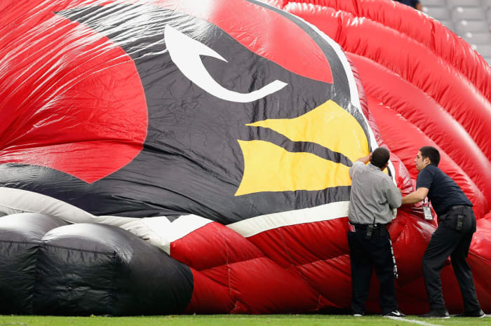 Arizona Cardinals inflatable helmet being taken down.