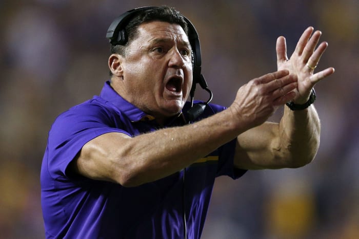 Ed Orgeron of the LSU Tigers calls a timeout during the second half of a game against the Mississippi Rebels.