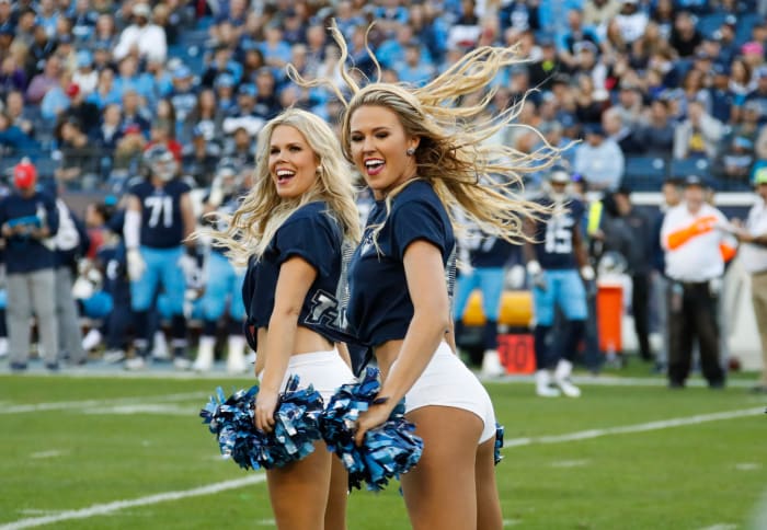 Tennessee Titans cheerleaders perform on the field.