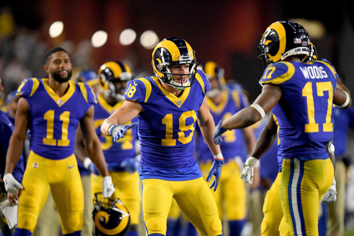 Cooper Kupp and Robert Woods celebrating on the field.