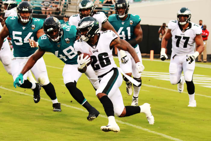 Miles Sanders carries the ball for the Philadelphia Eagles.