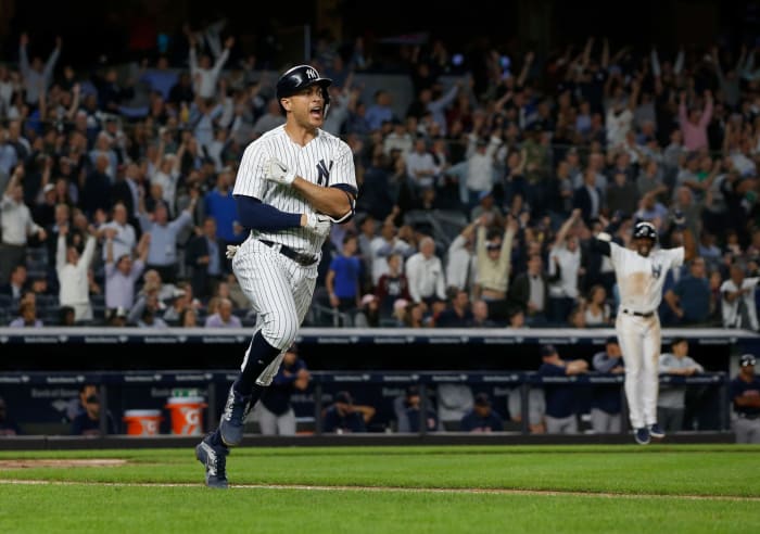 Giancarlo Stanton reacting to a home run.