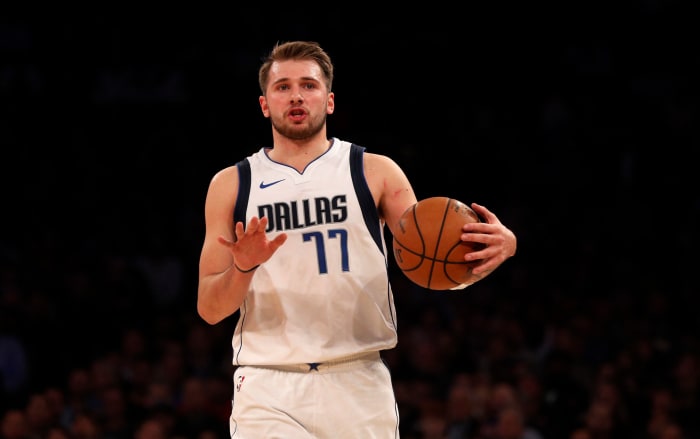 Luka Doncic slows down the offense during a game for the Mavericks.
