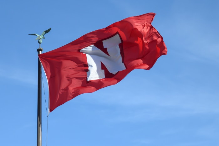 Nebraska's flag waves in the wind.