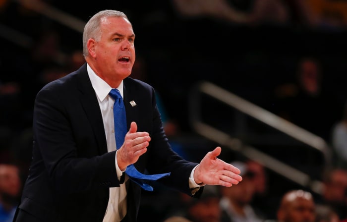 BYU head coach Dave Rose encourages his team.