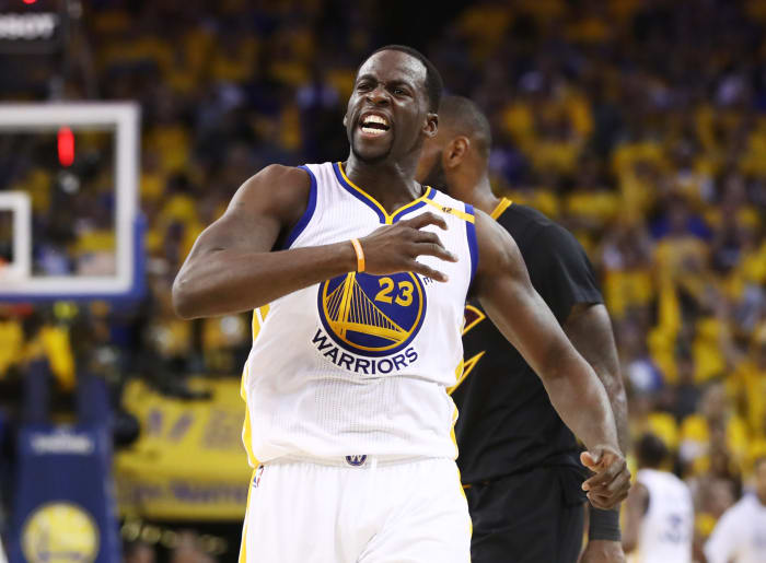 Draymond Green pounding his chest.