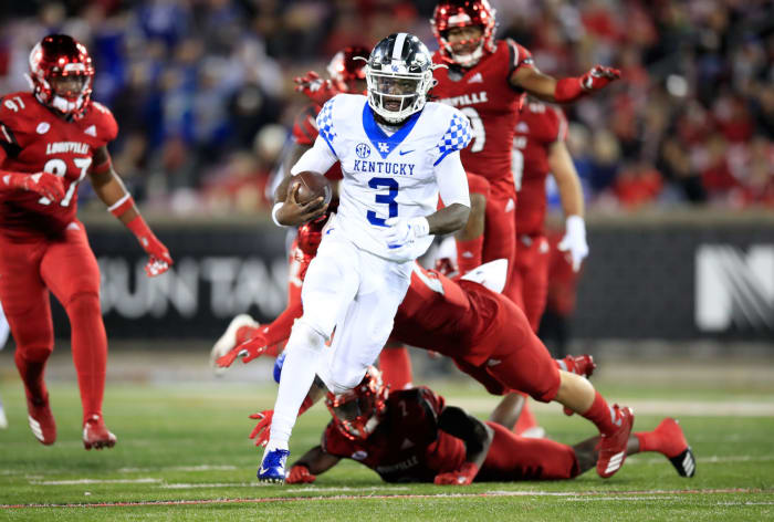 Terry Wilson runs during Kentucky-Louisville football.