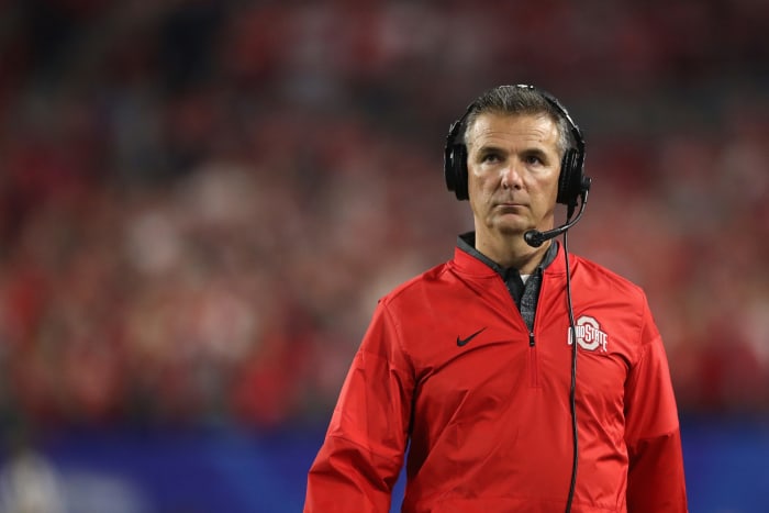 A closeup of Urban Meyer wearing an Ohio State jacket.