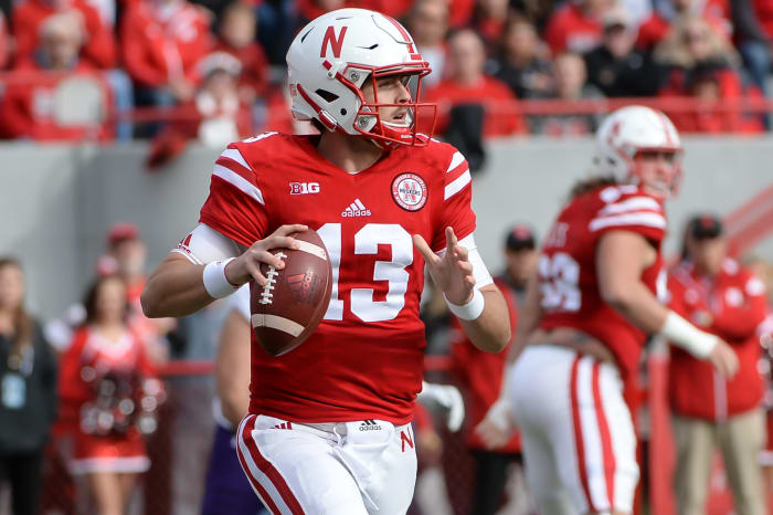 Tanner Lee rolls out of the pocket.