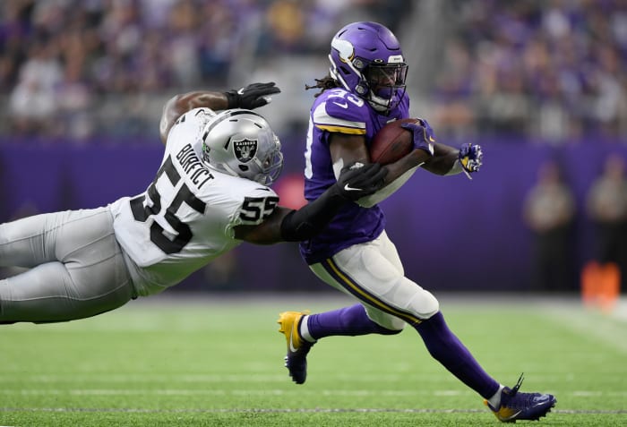 Vontaze Burfict goes for a tackle in Minnesota.