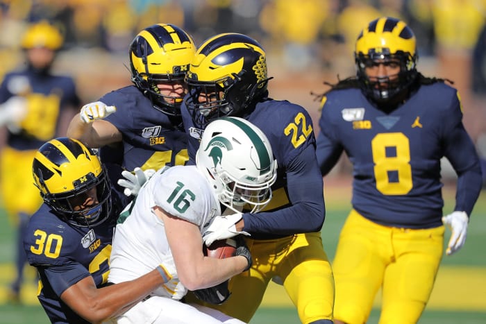 Daxton Hill and Gemon Green make the stop for the Michigan Wolverines.