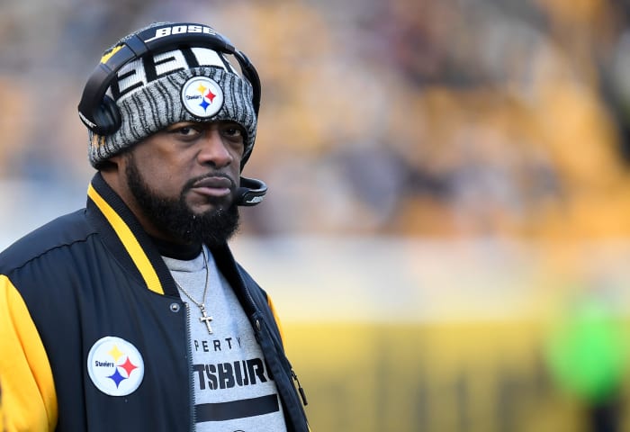 Mike Tomlin wearing a Steelers hat in Pittsburgh.