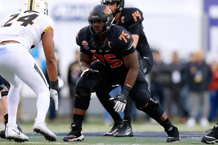 Marcus Keyes of the Oklahoma State Cowboys blocking.