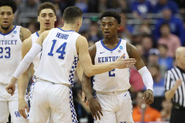 Tyler Herro intracting with Ashton Hagans.