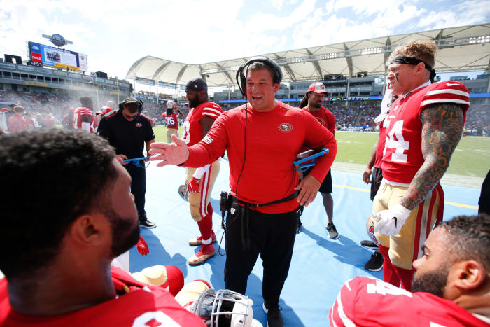 Chris Kiffin talks to his defensive line.