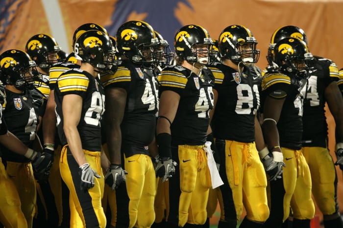 Iowa football walk out onto the field.