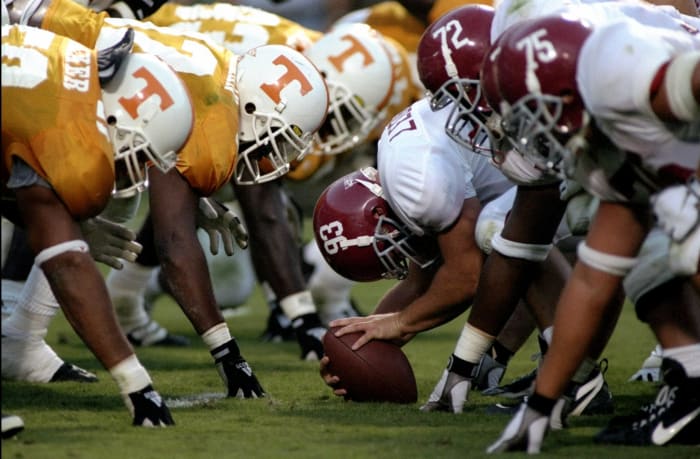 Alabama player Bradley Ledbetter snaps a ball against Tennessee.