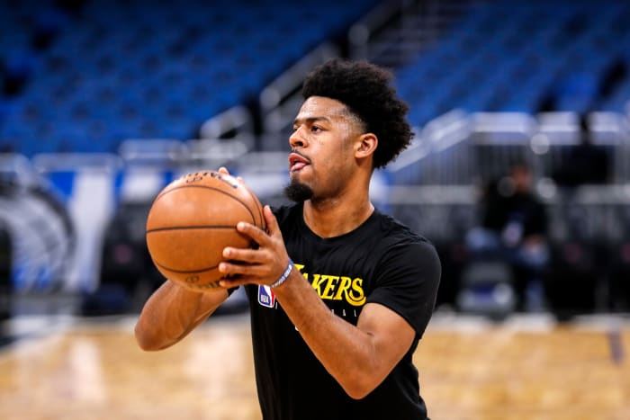 Quinn Cook shoots around in warmups for the Lakers.