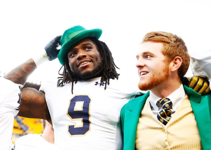 Jaylon Smith wearing the Notre Dame Mascot's hat.