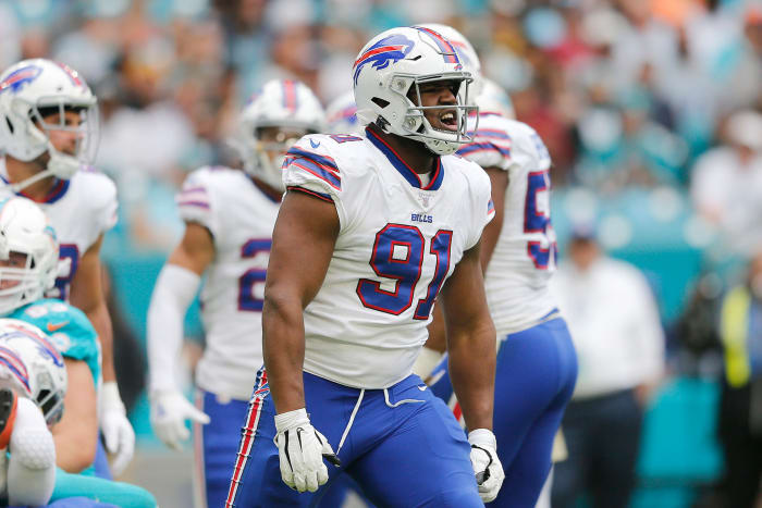 Bills defensive tackle Ed Oliver celebrates after a tackle.