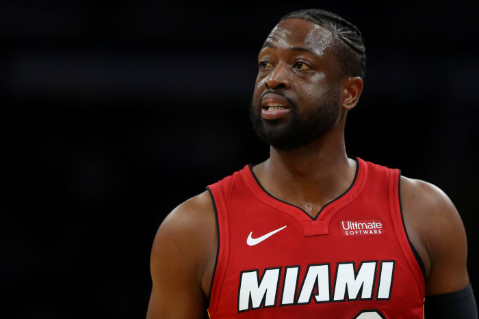 A closeup of Dwyane Wade in a red Miami Heat jersey.