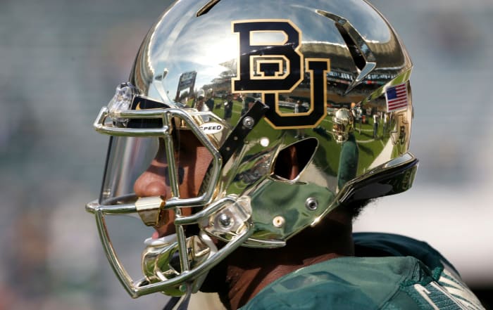 Chris Johnson #13 of the Baylor Bears stands on the field before the Bears take on the Texas Longhorns at McLane Stadium.