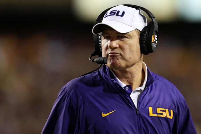 LSU coach Les Miles hangs on the sideline during a game against Texas A&M.