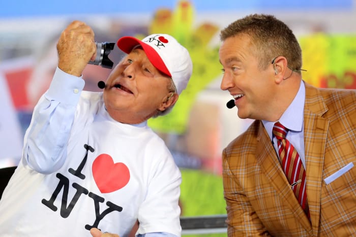 Lee Corso posing for a selfie with Kirk Herbstreit.