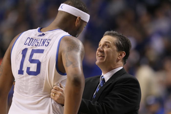 John Calipari gives instructions to DeMarcus Cousins.