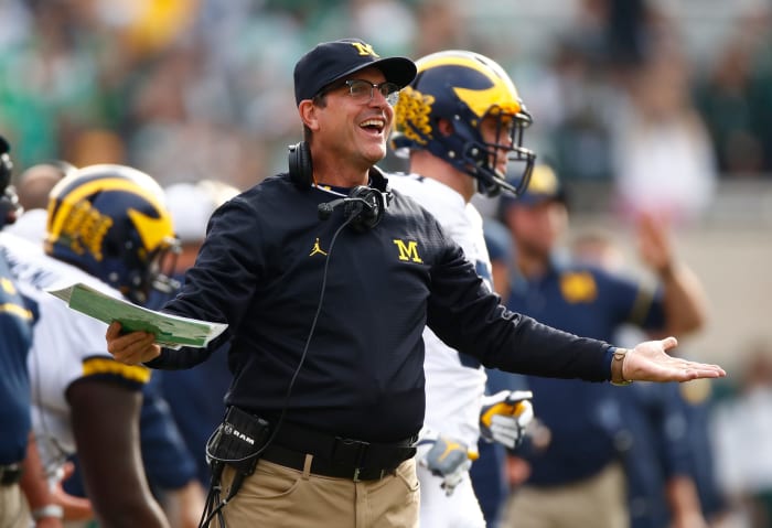 Head coach Jim Harbaugh reacts on the sidelines.