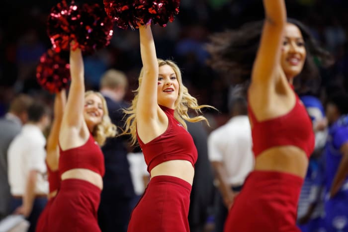 Arkansas cheerleaders performing during a game.