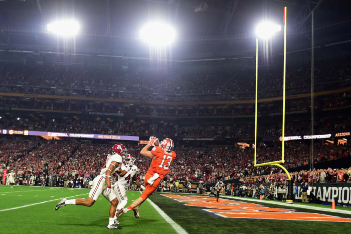 Hunter Renfrow #13 of the Clemson Tigers catches a 31 yard touchdown pass from Deshaun Watson #4 in the first quarter against the Alabama Crimson Tide.