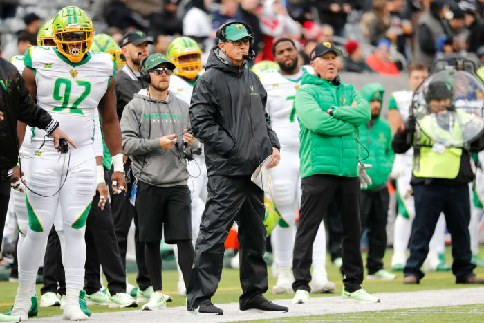 Marc Trestman watches from the sideline.